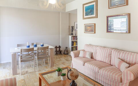 Giulia Apartment 2 - Levanto: Table, Furniture, Couch, Picture Frame, Property, Wood, Lighting, Interior Design, Flooring, Floor