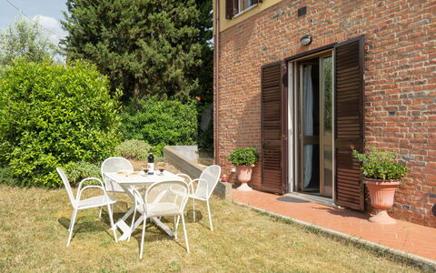 San Piero: Plant, Building, Furniture, Window, Table, Chair, Flowerpot, Tree, Outdoor Furniture, Shade