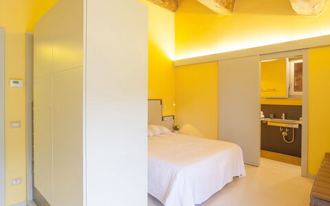Villa San Lorenzo: Room, Bed, Property, Yellow, Furniture, Bedroom, Interior Design, Ceiling, Building, Wall