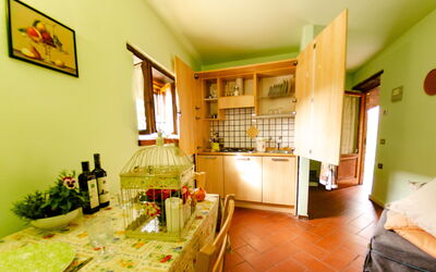 Bellavista Chiatri Geranio: Room, Property, Green, Furniture, Interior Design, Building, Yellow, House, Real Estate, Table