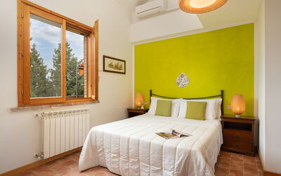 Geranio - Pool View First Floor: Furniture, Interior Design, Bed, Wall, Floor, Flooring, Bedroom, Room, Wood, Ceiling