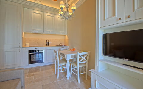 Il Sole Di Vino: Property, Room, Furniture, Kitchen, Floor, Yellow, Cabinetry, Building, House, Interior Design