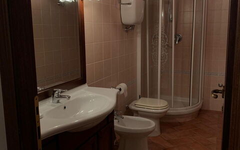 Villa Fontanelle: Plumbing Fixture, Sink, Tap, Property, Bathroom Sink, Bathroom, Mirror, Purple, Building, Wood