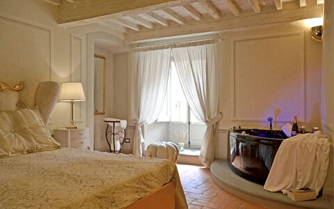 Appartamento Tommasi Fierli: Room, Furniture, Bedroom, Bed, Property, Interior Design, Bed Sheet, Bed Frame, Curtain, Suite