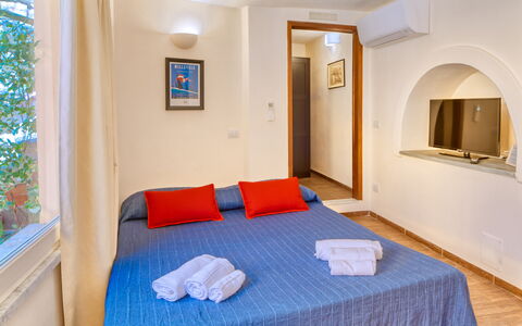 Portovecchio Apartments - Levanto: Furniture, Interior Design, Wood, Flooring, Floor, Room, Apartment, Bedroom, Bed, Home