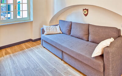 Polpo Apartment - Levanto: Flooring, Couch, Wood, Interior Design, Floor, Furniture, Apartment, Wood Flooring, Living Room