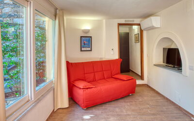 Ziguela Apartment - Levanto: Interior Design, Furniture, Flooring, Wood, Floor, Room, Ceiling, Couch, Living Room, Apartment