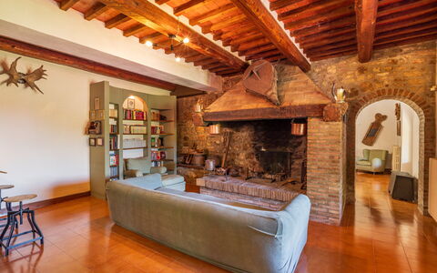 Podere a Lafi: Property, Picture Frame, Wood, Interior Design, Beam, Couch, Floor, Flooring, Wall, Living Room