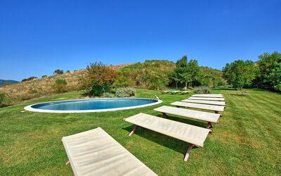 Tenuta Di Spineto: Property, Grass, Natural Landscape, Real Estate, House, Estate, Swimming Pool, Land Lot, Home, Lawn