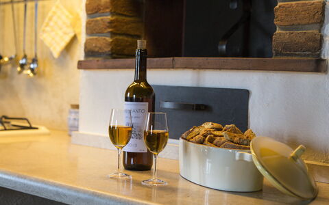 Villa Claudia: Food, Table, Bottle, Tableware, Wine, Barware, Plate, Interior Design, Drinkware, Wood