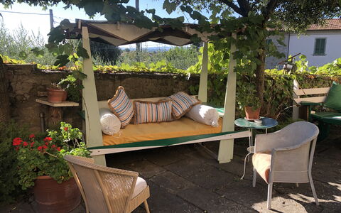 Villa Toppani Del Sodo: Backyard, Outdoor Table, Patio, Property, Yard, Furniture, Outdoor Furniture, Table, Landscaping, Garden