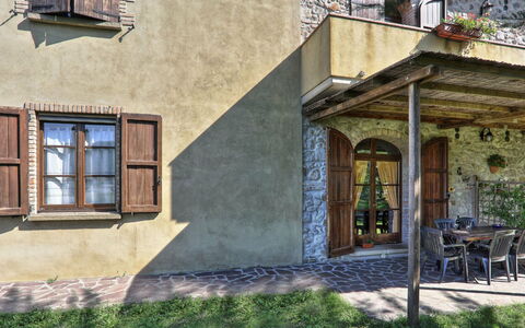 Agriturismo Le Selvole: Plant, Window, Property, Building, Architecture, Wood, Neighbourhood, Wall, Cottage, Porch