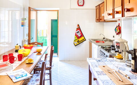 Luigina - Levanto: Room, Lighting, Interior Design, Yellow, Table, Interior Design, Ceiling, Light Fixture, Orange, Kitchen