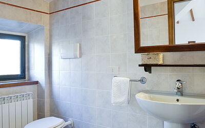 Colombaio: Mirror, Property, Sink, Plumbing Fixture, Bathroom Sink, Blue, Purple, Window, Bathroom, Lighting