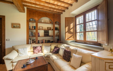 Grezzano Villa: Furniture, Couch, Picture Frame, Property, Table, Window, Wood, Living Room, Interior Design, Architecture