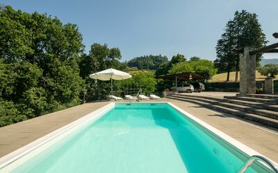 Grezzano Villa: Water, Plant, Sky, Property, Swimming Pool, Tree, Azure, Shade, Body Of Water, Grass