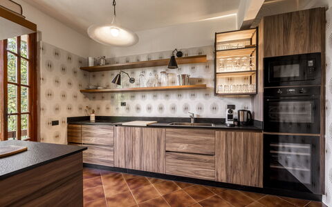 Villa Del Mugello: Cabinetry, Countertop, Furniture, Kitchen, Drawer, Wood, Kitchen Stove, Lighting, Flooring, Interior Design