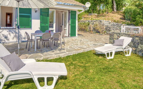 Marlà - Levanto: Furniture, Property, Plant, Building, Window, Outdoor Furniture, House, Shade, Grass, Leisure