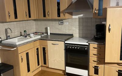 Apartment 4: Cabinetry, Countertop, Property, Furniture, Sink, Kitchen Stove, Tap, Kitchen, Kitchen Sink, Drawer