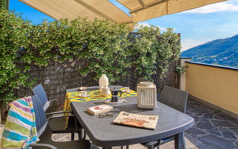 Villa Dell'erta - Levanto, Montale: Table, Furniture, Property, Blue, Shade, Outdoor Table, Outdoor Furniture, Chair, Interior Design, Building