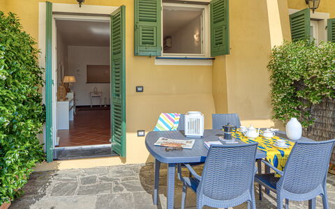 Villa Dell'erta - Levanto, Montale: Table, Plant, Furniture, Property, Chair, Green, Azure, Building, Blue, Interior Design