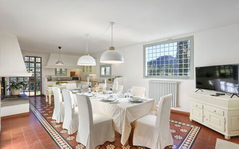 Villa Maona: Table, Furniture, Chair, Cabinetry, Kitchen, Lighting, Interior Design, Countertop, Building, Kitchen & Dining Room Table