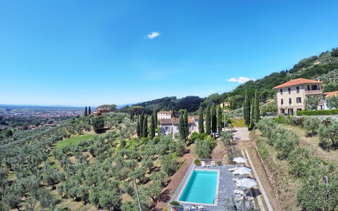 Villa Maona: Sky, Plant, Building, Water, Cloud, Azure, Tree, Vegetation, Urban Design, Residential Area