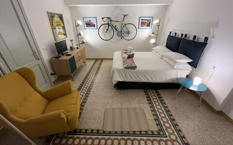 Villa Maona: Picture Frame, Furniture, Couch, Comfort, Living Room, Building, Lighting, Interior Design, Lamp, Flooring