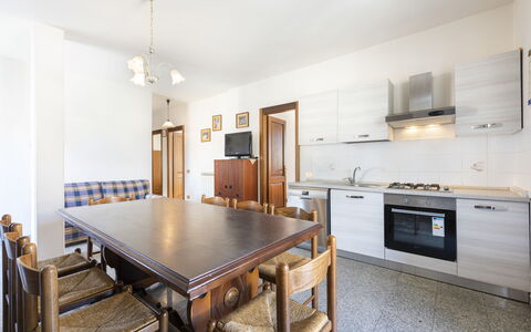 Residenza Garosi: Cabinetry, Furniture, Property, Table, Countertop, Drawer, Wood, Kitchen Stove, Lighting, Building