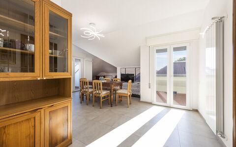 Casa Serchio: Table, Furniture, Building, Cabinetry, Wood, Chair, Hall, Interior Design, Lighting, House