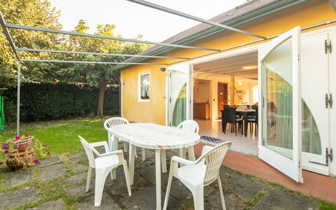 Villa Isola: Furniture, Plant, Table, Property, Window, Building, Chair, Shade, Door, Outdoor Table