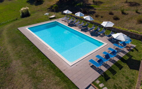 Villa Lugnano: Building, Plant, Swimming Pool, Water, Azure, Rectangle, House, Grass, Shade, Urban Design