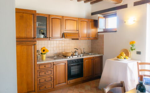 Villa Lugnano: Cabinetry, Countertop, Furniture, Property, Sink, Chair, Kitchen, Kitchen Appliance, Building, Kitchen Stove