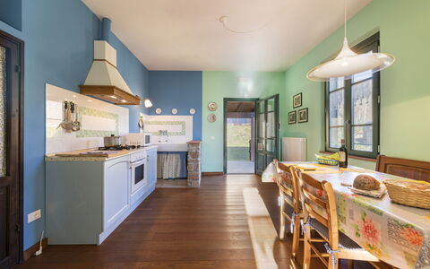 Villa Rosata: Cabinetry, Furniture, Countertop, Property, Kitchen, Kitchen Appliance, Wood, Lighting, Interior Design, Architecture