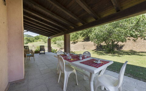 Villa Rosata: Plant, Table, Shade, Tree, Chair, Wood, Outdoor Furniture, Building, Outdoor Table, Leisure