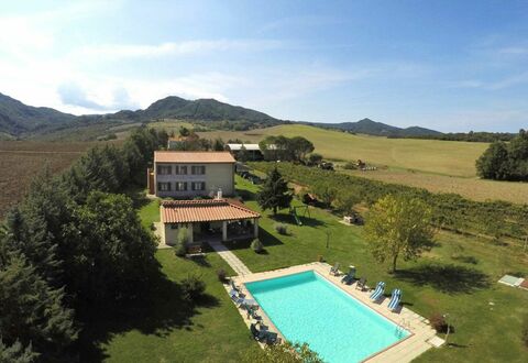 Villa Le Selvole: Sky, Cloud, Water, Building, Plant, Mountain, Tree, Land Lot, Swimming Pool, Grass