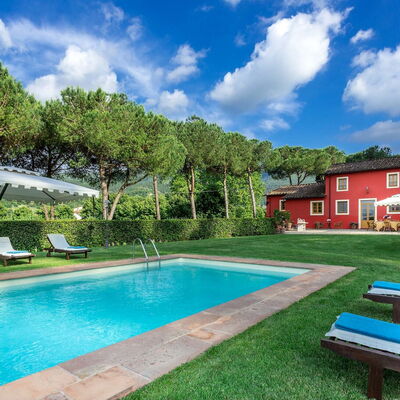Villa Guamo: Cloud, Plant, Water, Property, Building, Sky, Swimming Pool, Tree, Azure, Outdoor Bench
