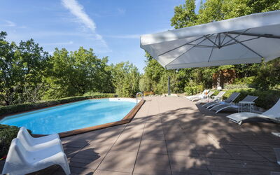 Villa Monteresi: Sky, Water, Cloud, Swimming Pool, Shade, Plant, Outdoor Furniture, Architecture, Tree, Sunlounger
