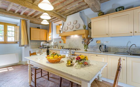 Villa Castellaccio: Cabinetry, Furniture, Window, Countertop, Kitchen, Lighting, Wood, Interior Design, Table, Kitchen Appliance