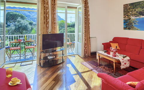 Apartment Fernanda - Levanto: Property, Furniture, Table, Couch, Wood, Comfort, Interior Design, Living Room, Flooring, Architecture