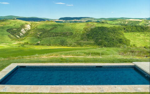 Casa Insieme: Sky, Water, Cloud, Water Resources, Property, Green, Blue, Plant, Rectangle, Swimming Pool
