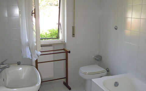 Casa Argentario: Plumbing Fixture, Property, Bathtub, Sink, Tap, Bathroom, Window, Building, Purple