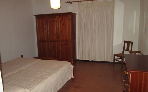 Giannella Holiday Apartment: Furniture, Comfort, Wood, Lighting, Building, Interior Design, Door, Flooring, Floor