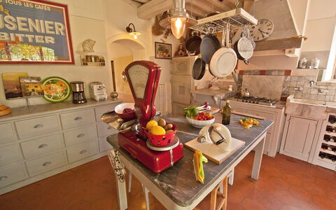 Villa Badia: Table, Furniture, Cabinetry, Tableware, Food, Lighting, Chair, Interior Design, Wood, Drawer