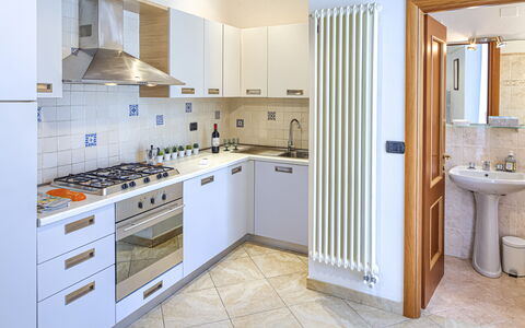 Apartments Mafalda - Levanto: Cabinetry, Property, Furniture, Countertop, Sink, Kitchen Appliance, Kitchen Stove, Bathroom, Tap