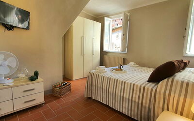 Loft Lucca: Furniture, Property, Cabinetry, Window, Comfort, Wood, Interior Design, Drawer, Bed Frame, Building