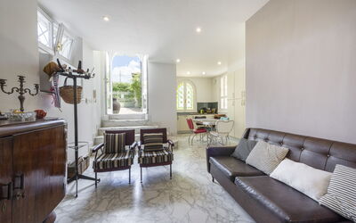 Appartamento Mara: Furniture, Couch, Table, Cabinetry, Interior Design, Chair, Wood, Houseplant, Living Room, Floor