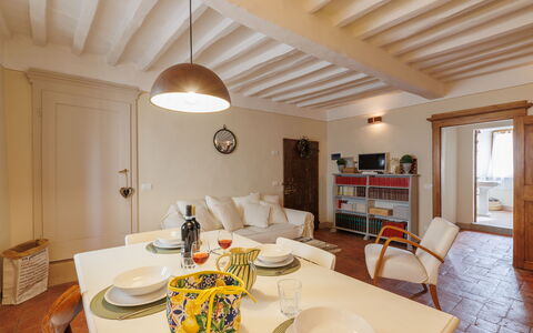 Appartamento Mancini: Table, Furniture, Property, Tableware, Building, Picture Frame, Chair, Wood, Interior Design, Lighting