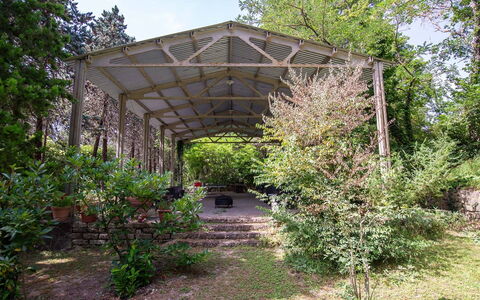 Villa Pania: Plant, Sky, Shade, Tree, Groundcover, Shrub, Landscape, Grass, Outdoor Structure, Garden
