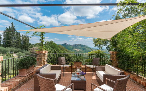 Villa Vico: Cloud, Sky, Plant, Property, Furniture, Table, Tree, Shade, Chair, Building